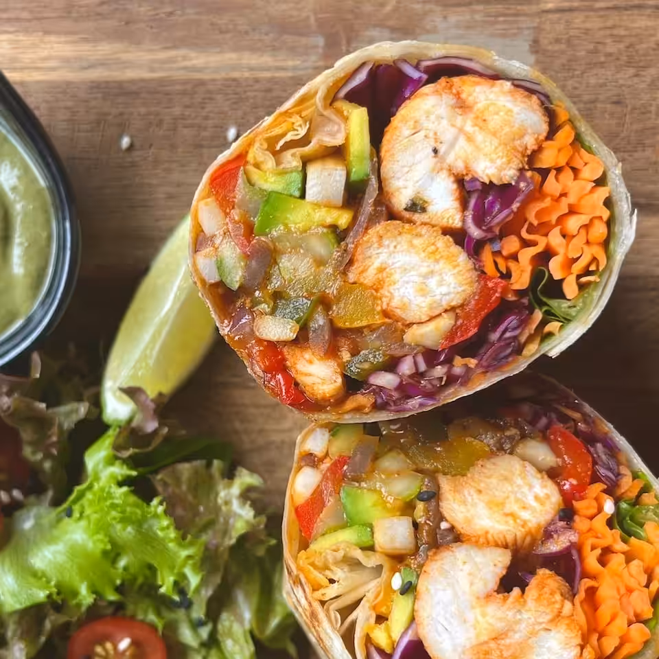 Grilled chicken wrap with fresh vegetables and side salad from the EATS café at Lamai Fitness Retreat